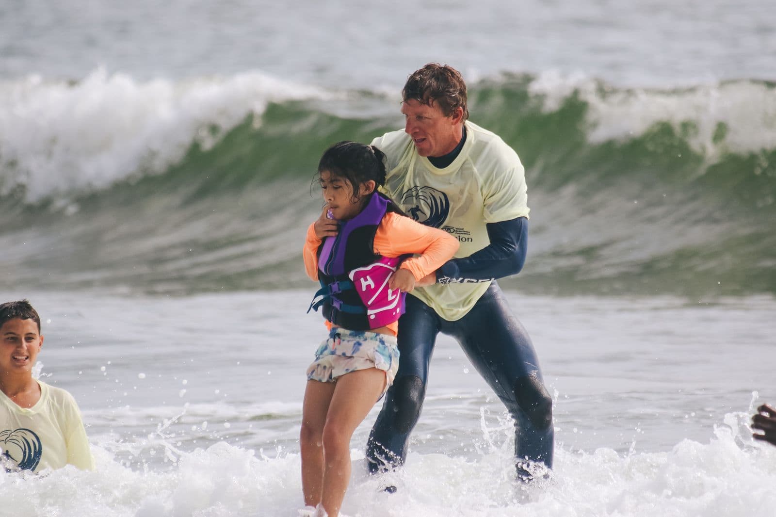 Bryan Gleason teaching surf lessons